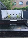 Luxe waterrijke tuin